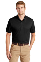 Male model wearing CornerStone Men's Industrial Snag-Proof Polo in black, featuring three-button placket and durable fabric for workwear.