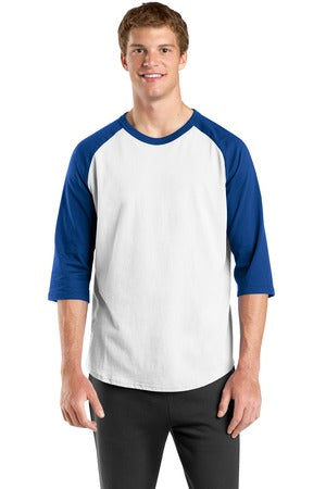 Male model wearing classic raglan baseball tee with white body and royal blue 3/4 sleeves, featuring crew neck and athletic fit.
