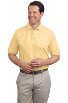  Male model in Port Authority Silk Touch Polo in banana yellow, featuring short sleeves, silky soft texture, and a classic three-button placket.